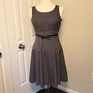 H&M dress, size 4, grey with black piping, dress at the knee